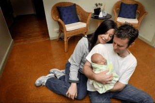 hypnobirthing couple with baby